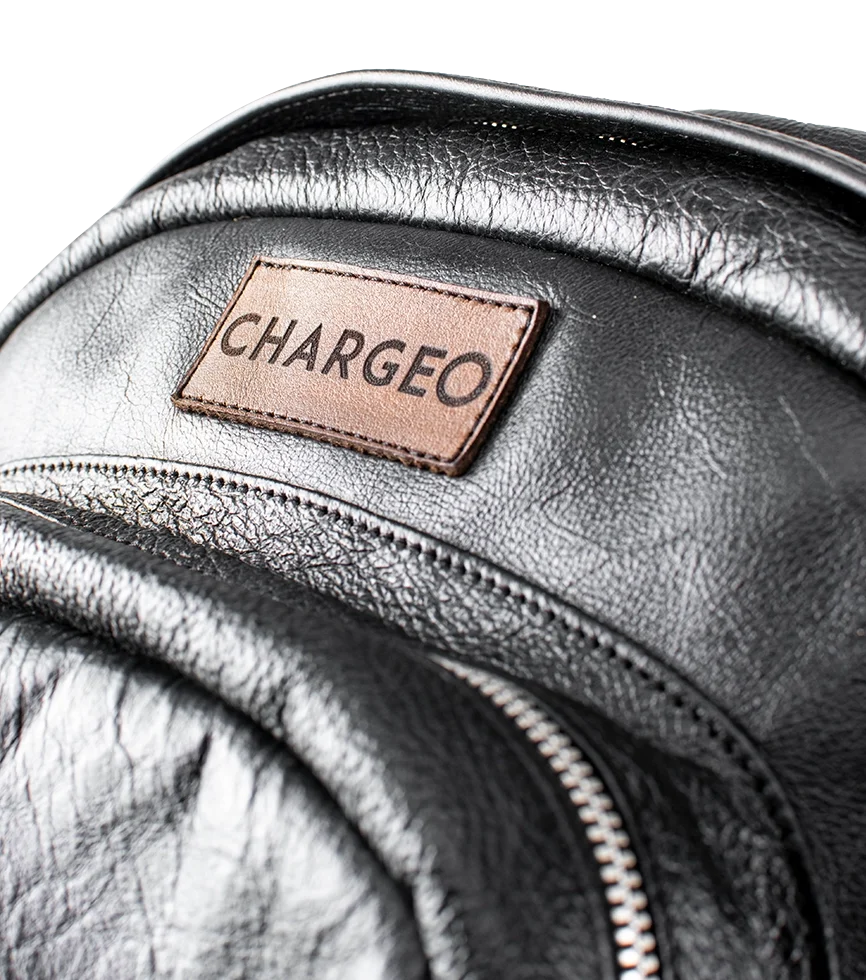 Close Up view of CHARGEO Park Town Backpack in Charcoal leather.