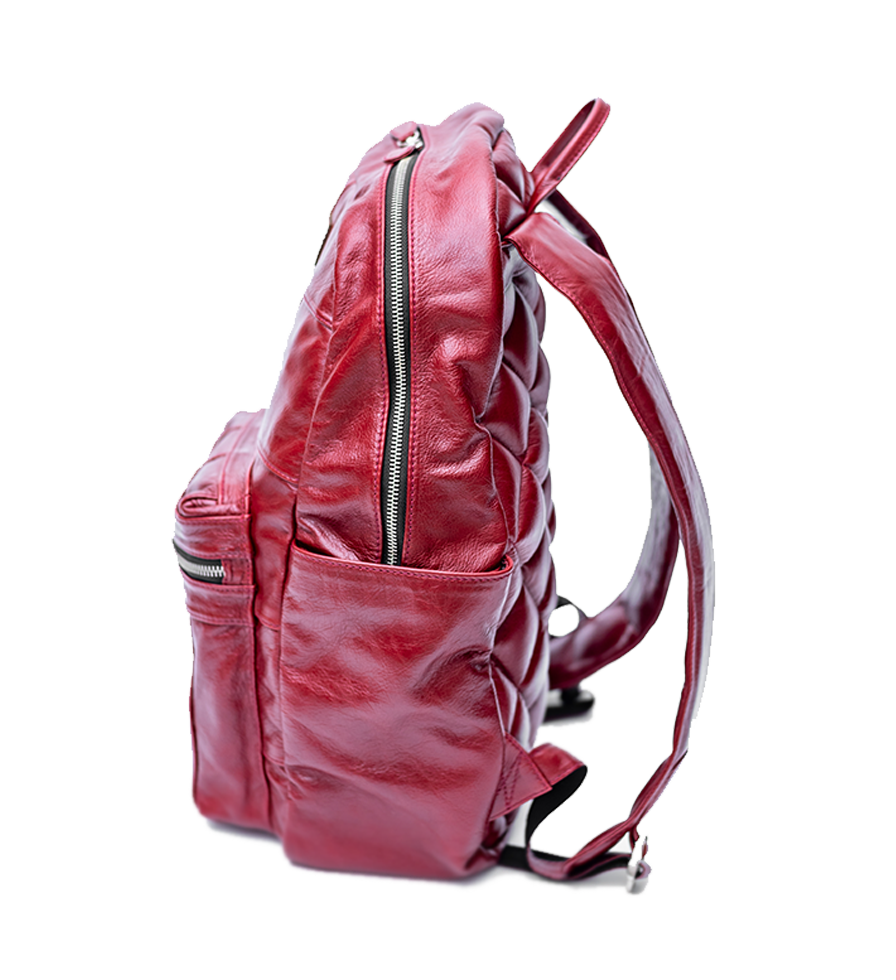 CHARGEO Leather Westville Backpack Ruby Red side view. CHARGEO Leather Westville Backpack Ruby Red side view.