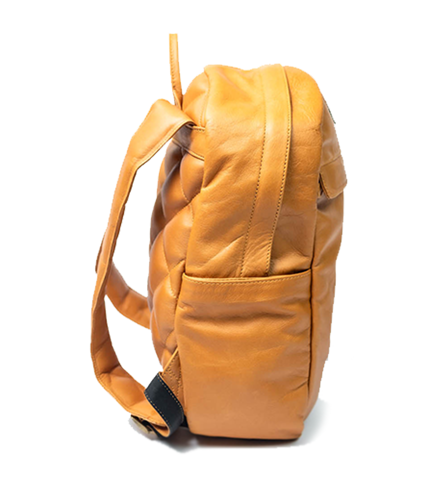 Side view of CHARGEO Waterfall Backpack in Butter Tan leather Side view of CHARGEO Waterfall Backpack in Butter Tan leather