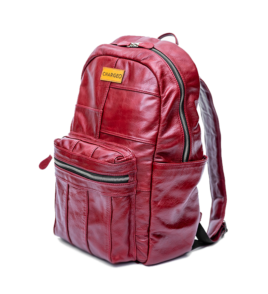 CHARGEO Leather Westville Backpack Ruby Red diagonal view. CHARGEO Leather Westville Backpack Ruby Red diagonal view.