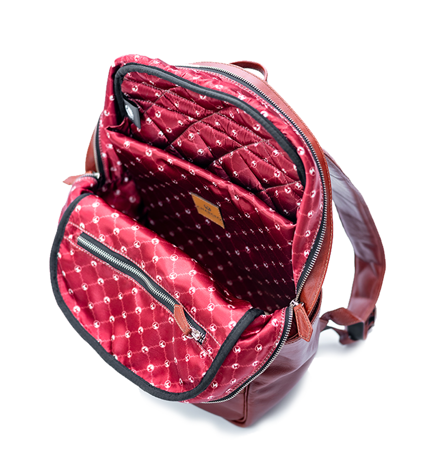 CHARGEO Leather Westville Backpack Ruby Red open view. CHARGEO Leather Westville Backpack Ruby Red open view.
