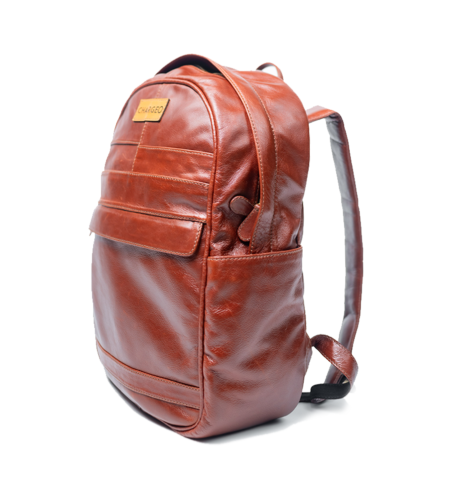 Diagonal view of CHARGEO Sandton Backpack in Cognac leather. Diagonal view of CHARGEO Sandton Backpack in Cognac leather.