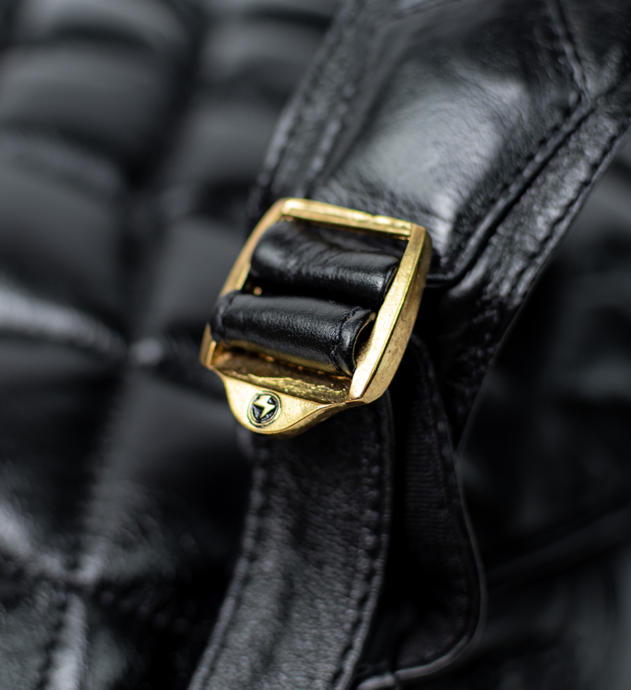 CHARGEO Cape Town luxury buckle Close Up view of the Charcoal leather backpack