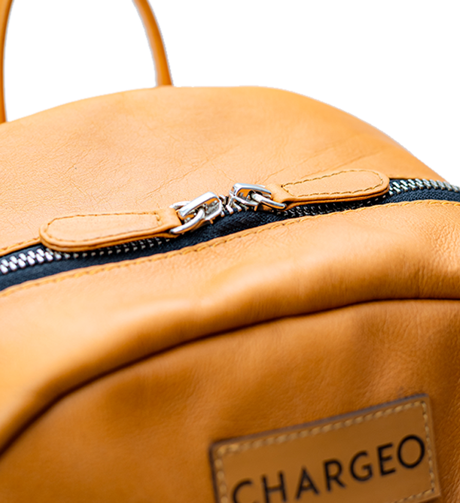 CHARGEO Bryanston luxury Close-up view of the Butter Tan leather backpack