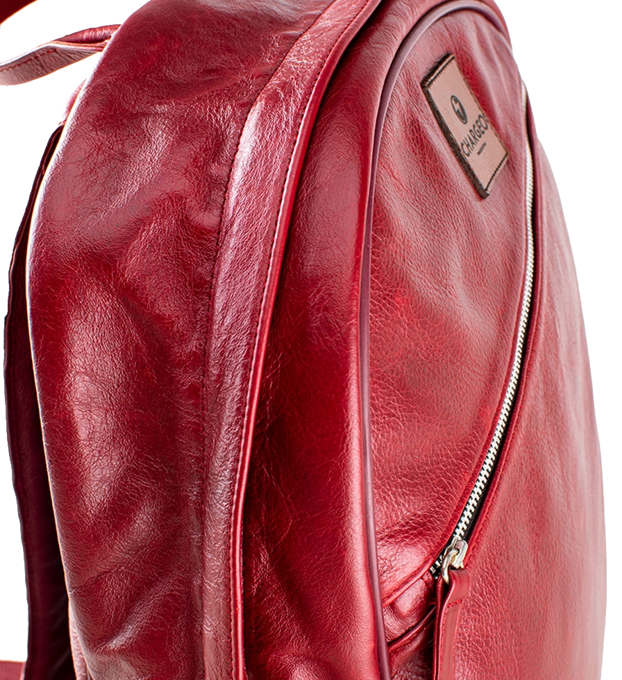 Close Up ToSide view of CHARGEO Pretoria Backpack in RedRuby leather Close Up ToSide view of CHARGEO Pretoria Backpack in RedRuby leather