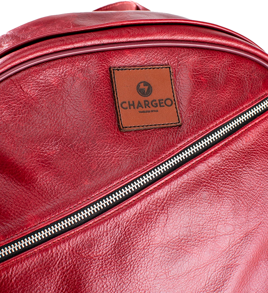 Close Up view of CHARGEO Pretoria Backpack in RedRuby leather. Close Up view of CHARGEO Pretoria Backpack in RedRuby leather.