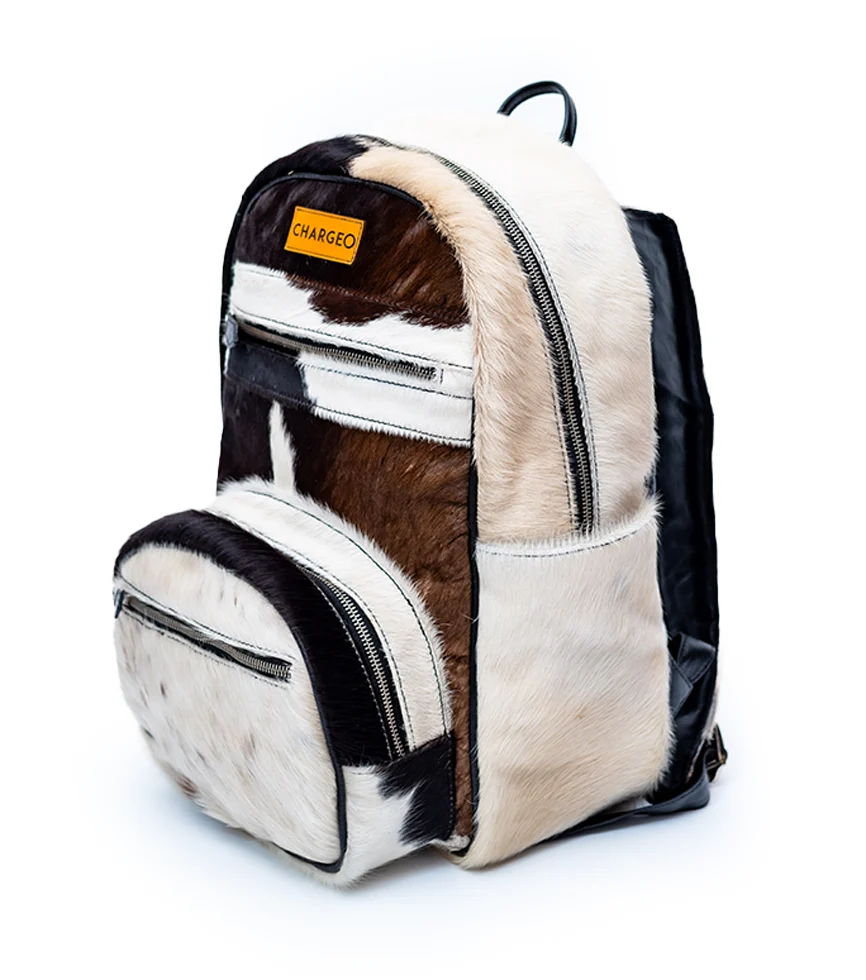 Diagonal view of the CHARGEO Zulu Treasure Backpack in cowhide