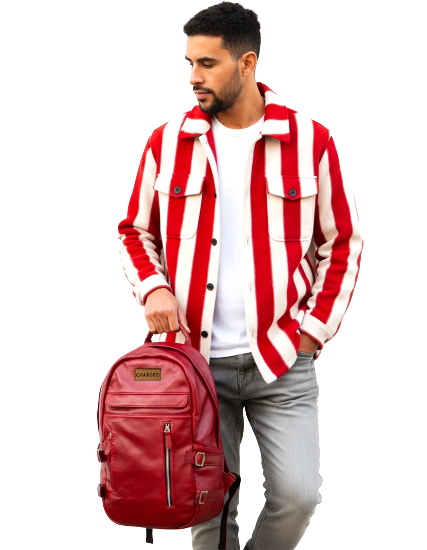 Man holding CHARGEO RedRuby leather Umhlanga Backpack by top handle