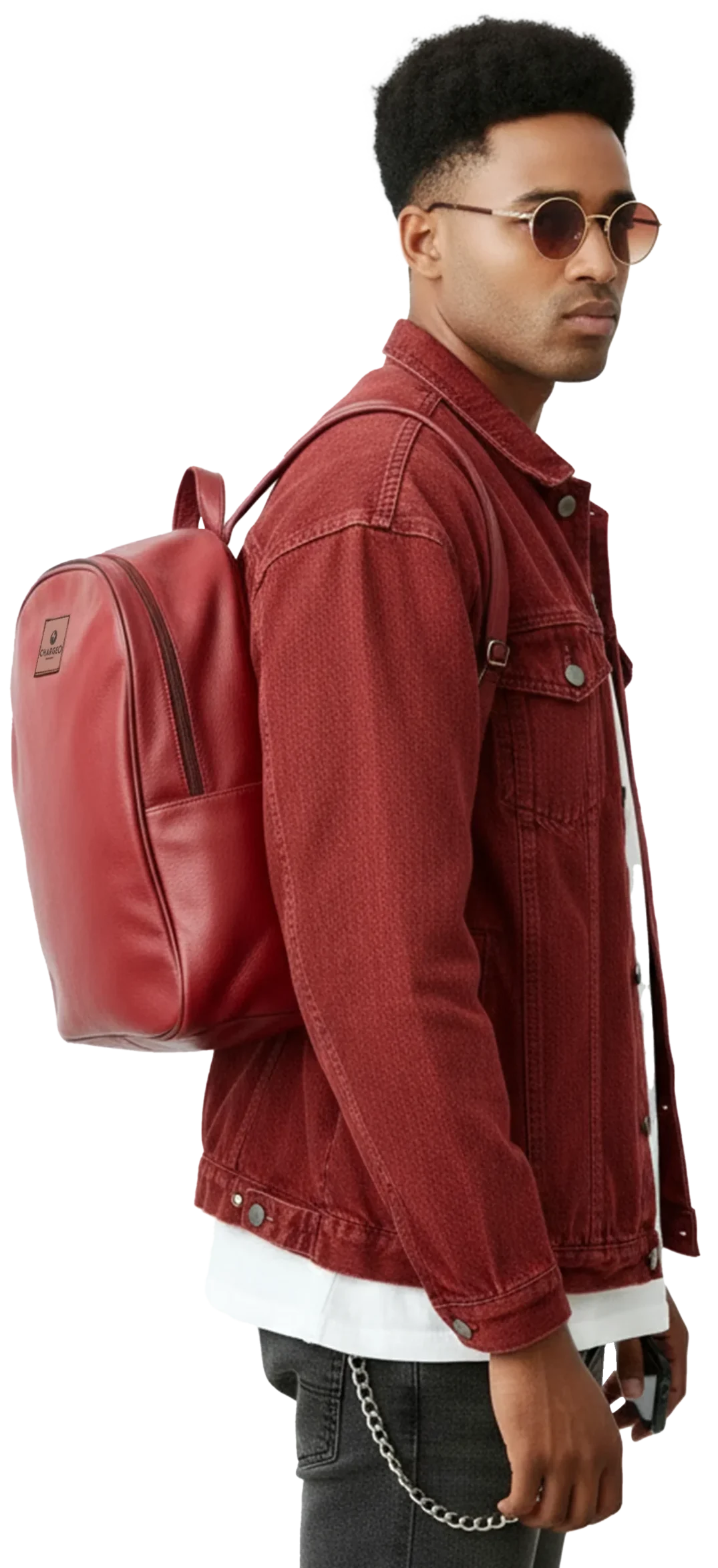 Man wearing the CHARGEO Constantia RedRuby leather backpack as a chic accessory