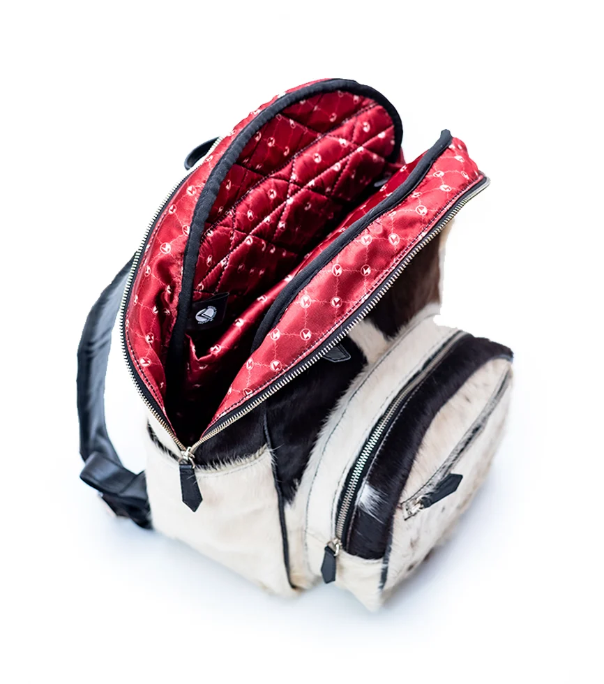 Open view of the CHARGEO Zulu Treasure Backpack in cowhide