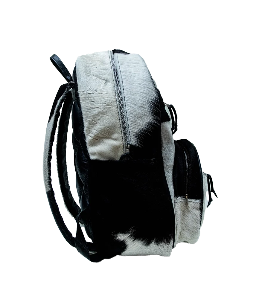 Side view CHARGEO Zulu Treasure Backpack in cowhide leather with Charcoal and white pattern