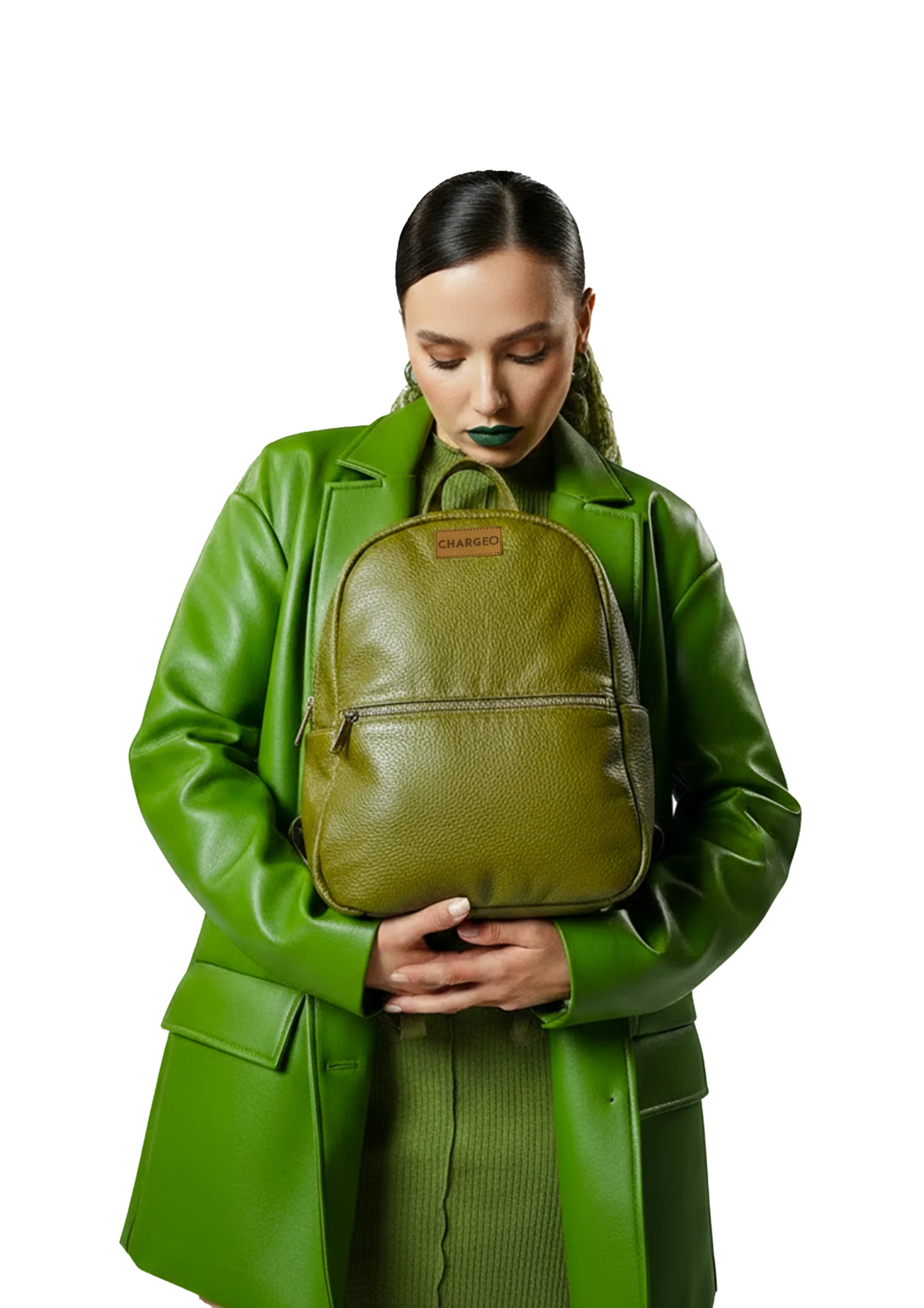 Woman holding the CHARGEO Fourways avocado leather backpack with both hands