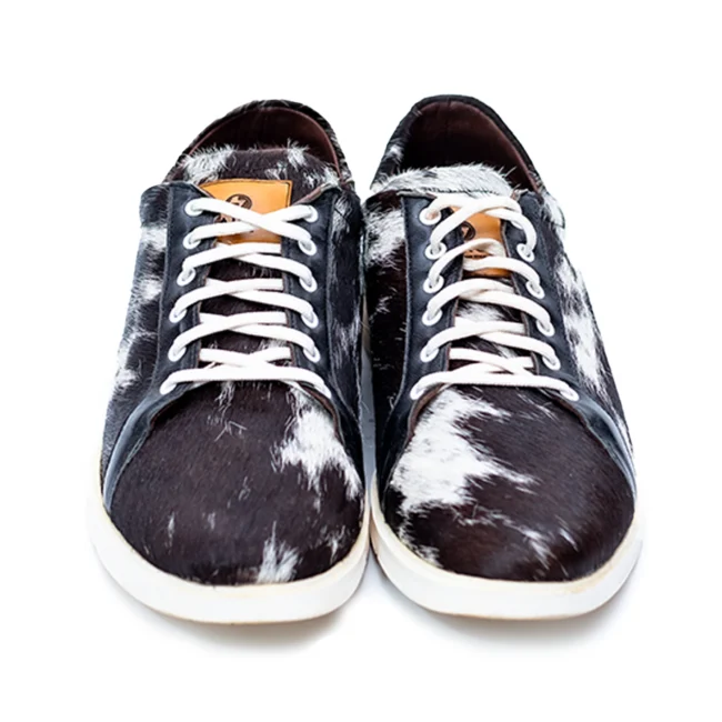 CHARGEO Zulu Treasure leather sneakers in black and white Nguni cowhide, front laced view