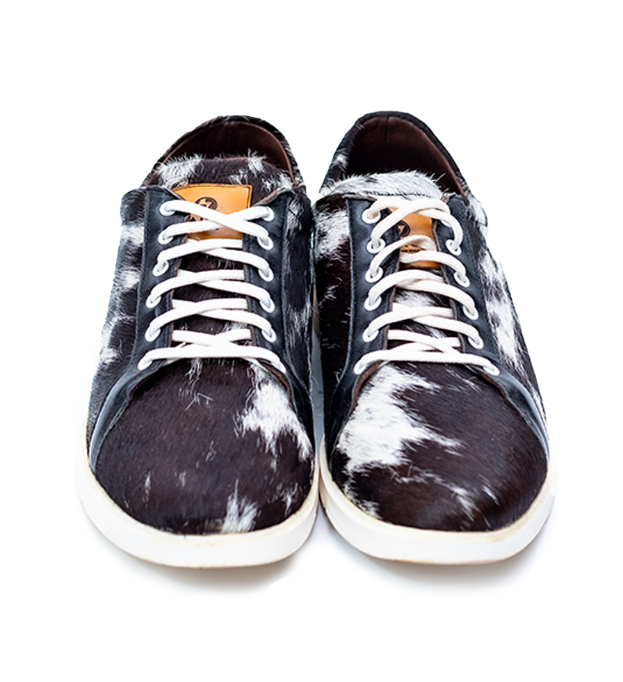 CHARGEO Zulu Treasure leather sneakers in black and white Nguni cowhide, front laced view