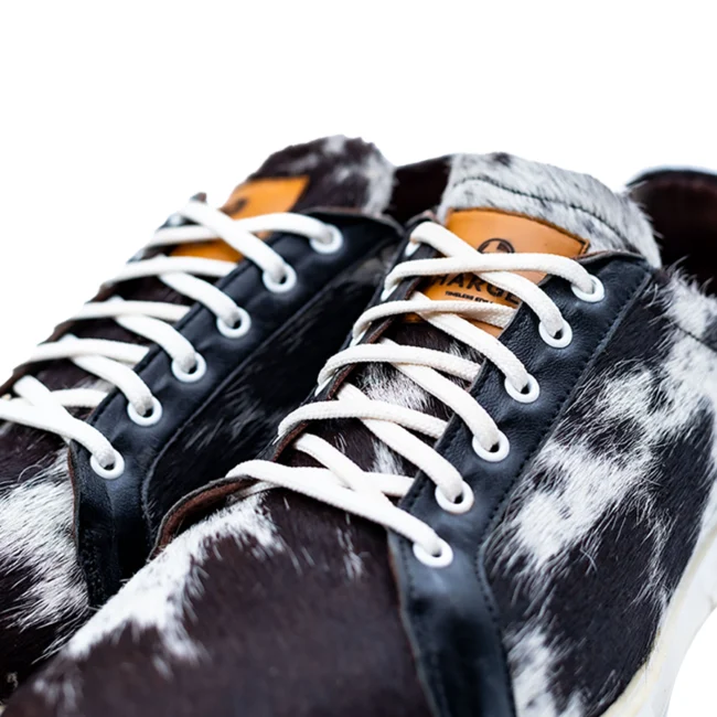 CHARGEO Zulu Treasure leather sneakers, close-up of laces and CHARGEO brand tag