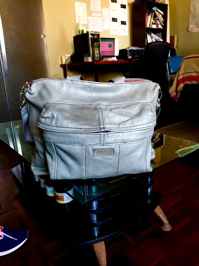 An early CHARGEO silver leather bag, June 2021